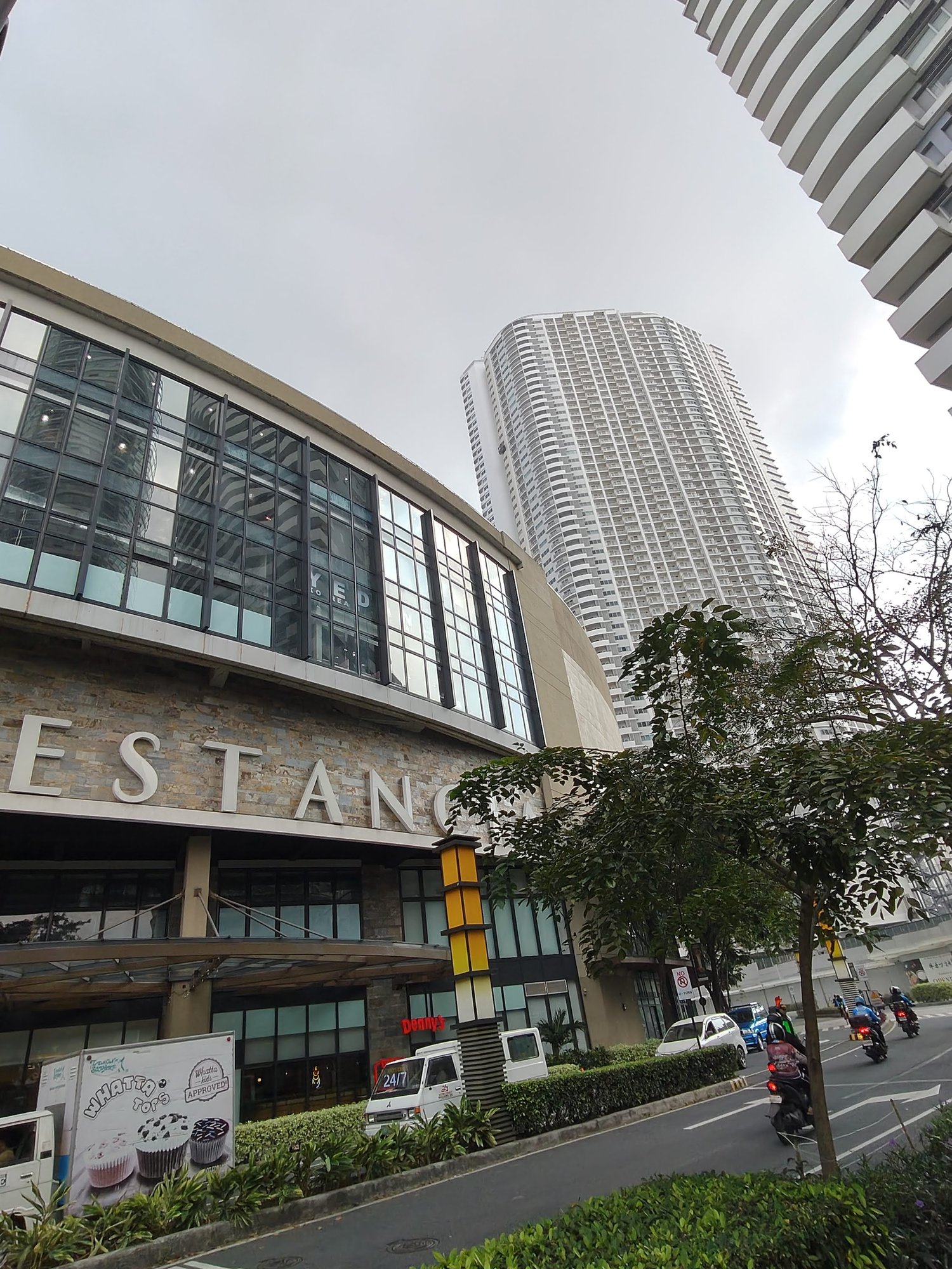 Foreground: Estancia Mall; Background: The Maven Foreground: Estancia Mall; Background: The Maven